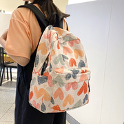 印花双肩包女韩版高中，书包女大学生涂鸦潮流大容量旅行包防水背包