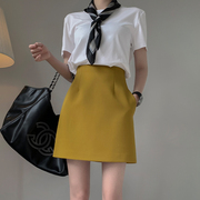 黄色高腰a字半身裙，女春秋2023设计感小众，休闲西装包臀短裙子