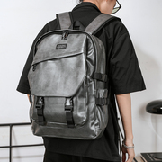 男双肩包韩版休闲潮流，旅行包背包pu皮个性时尚大容量大学生书包