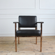 北欧单人设计沙发头层油蜡牛皮艺咖啡厅休闲靠背椅不锈钢实木