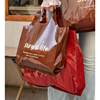 服装店手提袋袋高档棕色，印字女装塑料，包装袋打包袋装衣服袋子