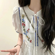 白色刺绣泡泡短袖连衣裙女2024夏季民族度假风，设计感气质公主长裙