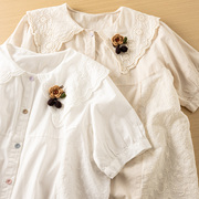 日系镂空刺绣娃娃领短袖衬衫女夏季绣花布拼接宽松减龄上衣