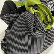 &黑白帆布包格子布单肩大容量条纹手提包可折叠旅行包包包行李袋