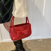 新年红色小众蝴蝶结手提包包女高级质感百搭ins单肩斜挎水桶包