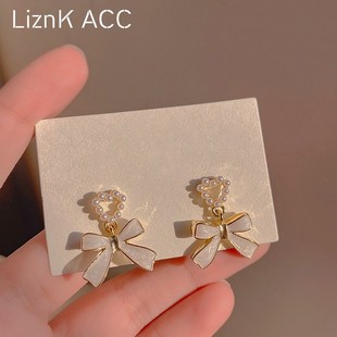 s925银针独特珍珠蝴蝶结，耳钉2022年潮，小众设计感高级耳环女