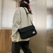 单肩包男女休闲情侣斜跨包时尚韩版便携女包个性简约手提帆布包包