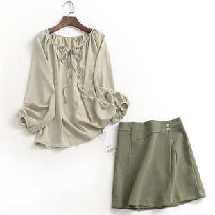 H808纯色宽松镂空圆领系带娃娃衫上衣春季2023长袖减龄女衬衫