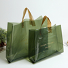高级感女装服装胶袋透明绿色，手拎袋袋清新衣服包装塑料袋定制