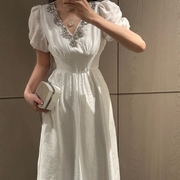 法式高级感仙女风纯棉白色气质连衣裙V领镶钻高腰收腰富家千金裙