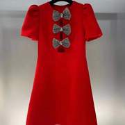 女装红色喜庆新裙子镂空泡泡袖金属蝴蝶结连衣裙女常规袖基本款