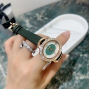 表带士镶钻椭圆形个性手表女简约气质时尚，石英真皮普通国产腕表
