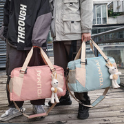 手提短途旅行包2024年男女轻便防水套拉杆行李袋大容量收纳包