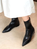 欧美靴子女2023年尖头短靴女黑色皮面瘦瘦靴平底靴显瘦弹力靴