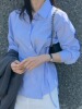 韩国chic春季设计感小众绑带收腰不规则纽扣翻领条纹衬衫女长袖潮