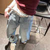 浅蓝色破洞牛仔裤女2024春季设计感小众美式复古宽松直筒长裤