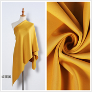 金黄色姜黄色(姜黄色)薄款空气层南韩丝弹力针织，布料打底衫裙子裤子面料