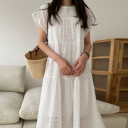 法式温柔白色连衣裙女夏季甜美风，花型镂空花瓣袖宽松休闲纯色长裙