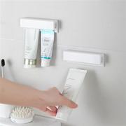 牙膏置物架壁挂式免打孔挤牙膏神器洗面奶夹子浴室卫生间墙上收纳