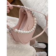 珍珠手提包包女式2024潮韩国小众腋下包高级洋气斜挎包新月包