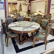 欧式新中乌金实木餐桌，奢华大理石真皮餐椅，1.5米圆形餐台雕刻组合