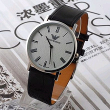* ARMANI (Giorgio Armani).  ultra-delgada aguja de reloj de cuarzo esfera blanca.