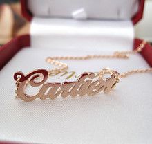 Cartier Cartier 2011 LOGOTIPO carta collar colgante de oro rosa de acero de titanio, la mujer nueva